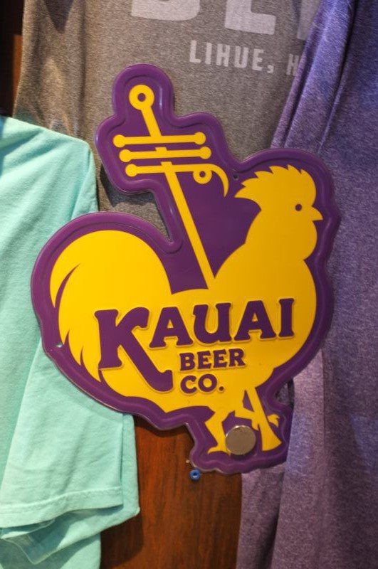 Diecut purple and gold metal Kauai Beer Co. rooster sign