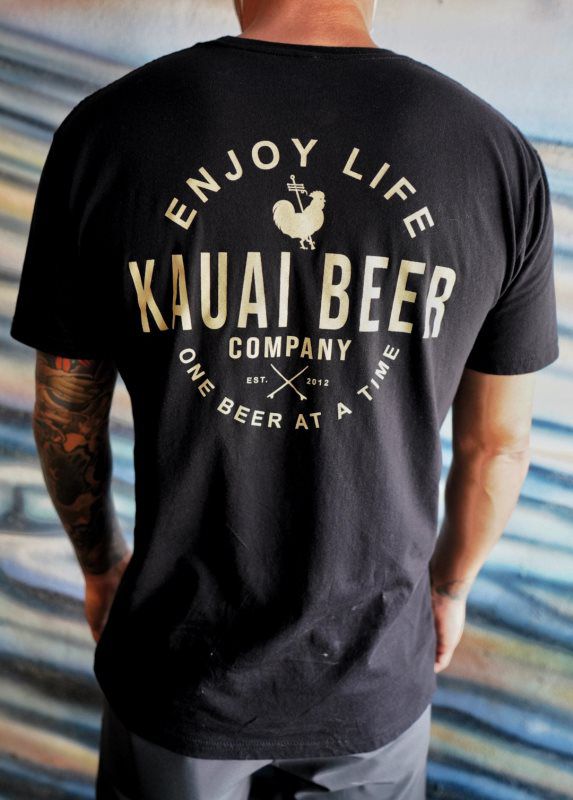 Back of a black Enjoy Life Kauai Beer Company shirt